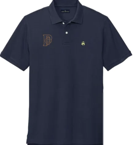 The same navy piqué polo with the monogram embroidered in gold